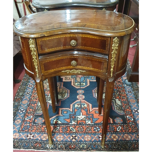 403 - A good pair of Walnut and burr Walnut kidney shaper continental side Tables with Omalu mounts. H 77 ... 