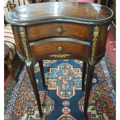 403 - A good pair of Walnut and burr Walnut kidney shaper continental side Tables with Omalu mounts. H 77 ... 