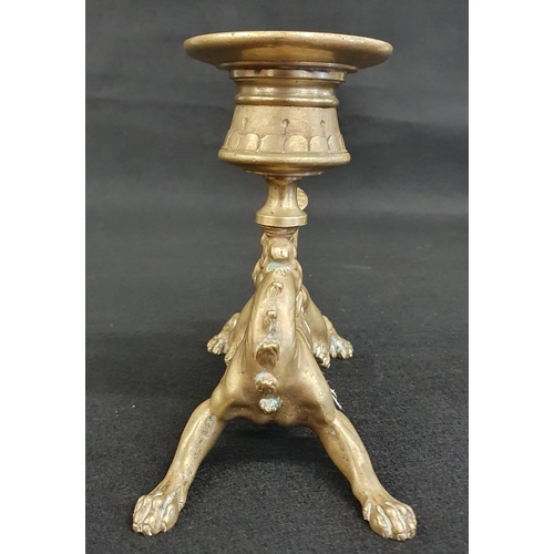 456 - A heavy 19th Century cast Brass chamber Candlestick in the form of a feline with dragon head support... 