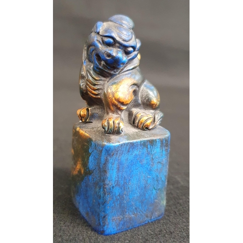 462 - A carved Chinese Lapis Lazuli coloured Hardstone Seal with fo-lion finial. H 7 cm approx