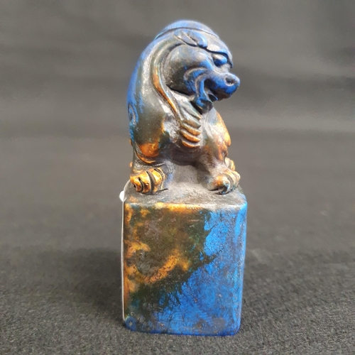 462 - A carved Chinese Lapis Lazuli coloured Hardstone Seal with fo-lion finial. H 7 cm approx