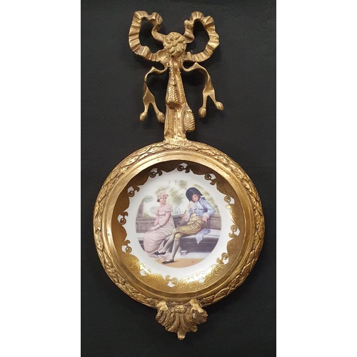 482 - A good pair of Metal wall mounted Plaques with porcelain plaque interior. H 40 x W 22 cm approx.