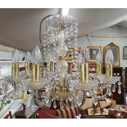 485 - A Glass eight branch Chandelier.
H 44 x W 55 cm approx.