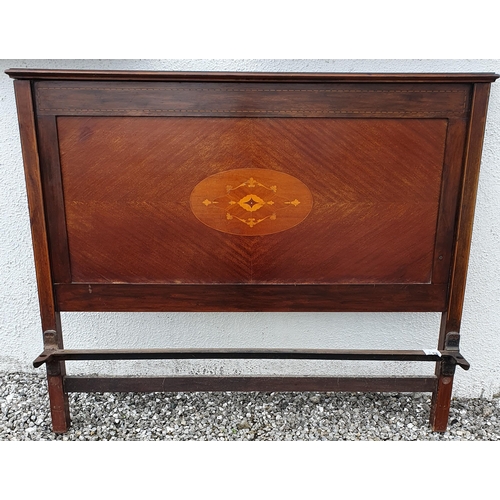 499 - A good Edwardian Mahogany and inlaid Bed with bow fronted footboard, side rails and matters base .
H... 