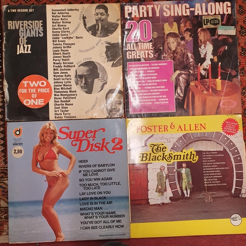 522 - A Murphy's Vinyl Record player along with 2 boxes of records. Mixed lot Mainly Oldies ,Irish and Mus... 