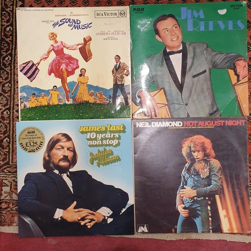 522 - A Murphy's Vinyl Record player along with 2 boxes of records. Mixed lot Mainly Oldies ,Irish and Mus... 