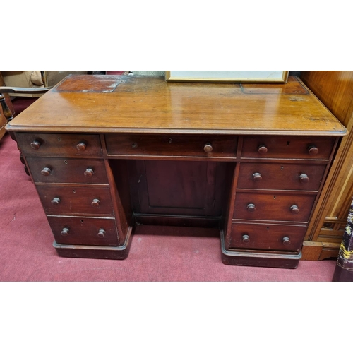 34 - A good 19th Century Mahogany Desk with triple frieze drawer over a bank of three drawers. W 118 x 57... 