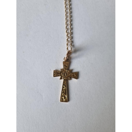 427 - An Antique Gold Cross and Chain.