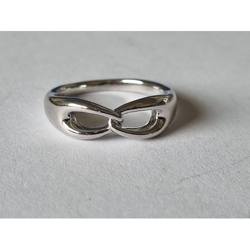 437 - A Tiffany style Silver Ring, size L.