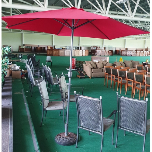 1 - A Red garden Parasol with stand .
Height 230 x D 260 cm approx.