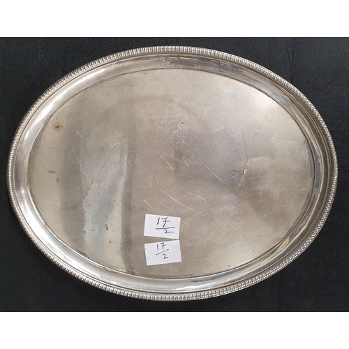 38 - A Regency oval Silver Plated Salver with bead edge, raised on four shell supports together with an a... 