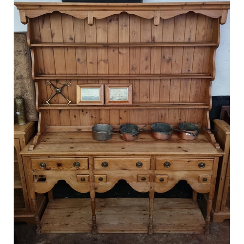 213 - A large late 19th early 20th Century stripped Pine Dresser. W 179 x 47 x H 217 cm approx.