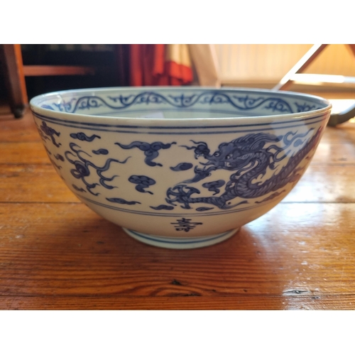 250 - An early Chinese Bowl with Blue and White ground, 23 diam x 11h cm approx.