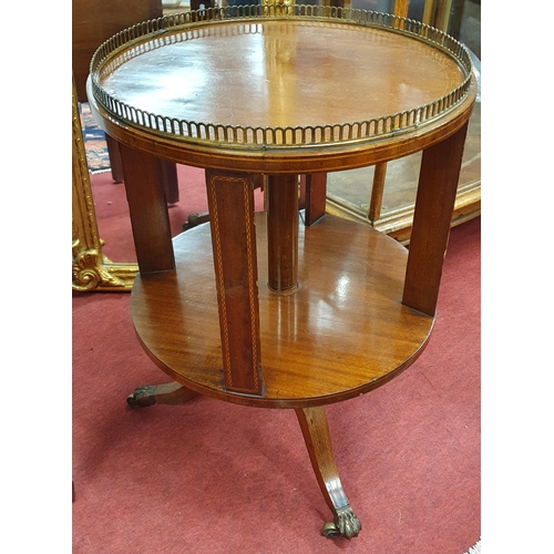 252 - A really good Edwardian Mahogany revolving Side Table on tripod supports with brass gallery top.
H 6... 