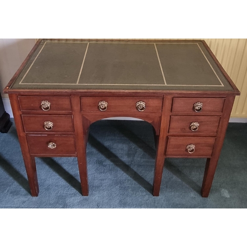 253 - A good early 19th Century Mahogany Kneehole Desk with single frieze centre flanked by three graduate... 