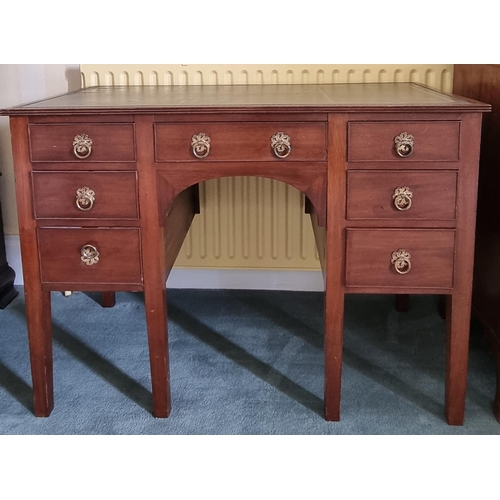 253 - A good early 19th Century Mahogany Kneehole Desk with single frieze centre flanked by three graduate... 