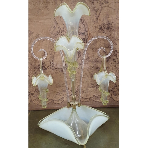 258 - A good 19th Century Vaseline three branch Glass Epergne with hanging baskets.
H 52 cm approx.