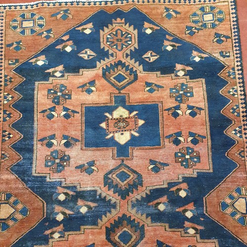 260 - A blue ground Rug with unique medallion design 283 x 158cm approx.