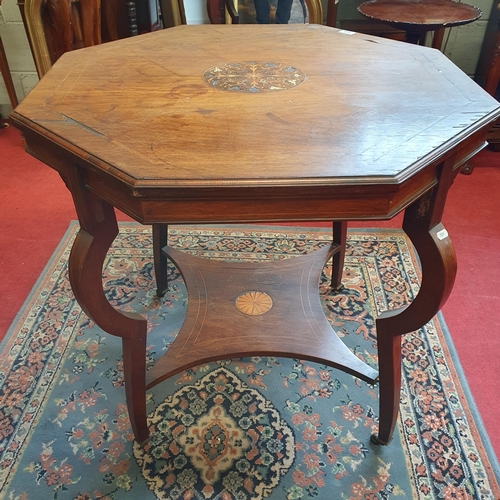 303 - An Edwardian Rosewood and Veneered Centre Table with gallery base and floral inlaid top.
H 72 x W 75... 