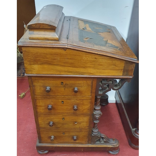 325 - A Victorian Walnut and Burr Walnut Davenport with four drawer side with lift up lid, fitted interior... 