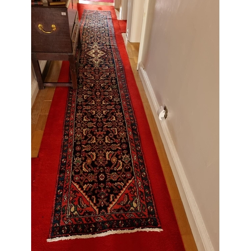 342 - A long fine woven full pile Persian Surok Runner with a deep Red ground and unique all over design. ... 