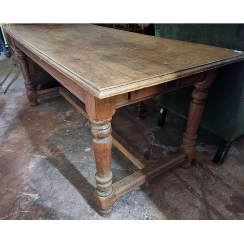 358 - A 20th Century Oak farm house Kitchen Table with veneered top, single frieze drawer on turned suppor... 