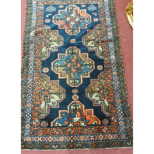 417 - A good Blue ground Persian Rug with central medallion design. L 173 x W 110 cm approx.