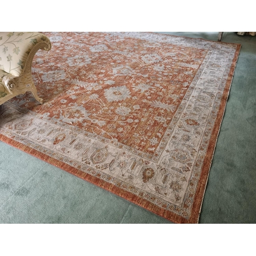 439 - A full pile Turkish Ziegler style Carpet with all over floral field in Terracotta and with a Cream b... 