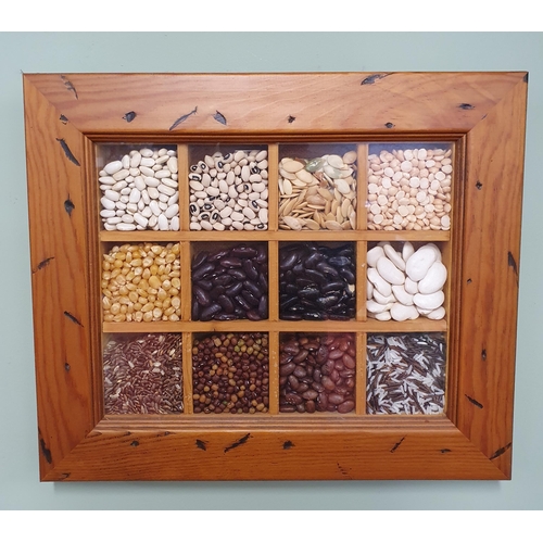 531 - A Group of Kitchen decorative Display items to include a framed seeds & beans,  an Autumn Corn bouqu... 