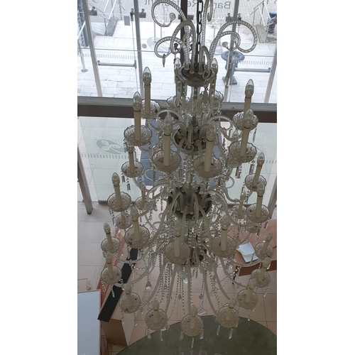 487 - A Magnificent Crystal Chandelier, over 7 FT High , 36 Branch 3 tiered. Initially purchased for over ... 