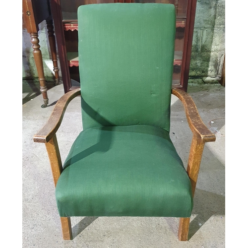 973 - A Green upholstered Arm Chair.