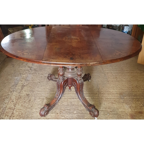 21 - A Victorian Walnut Dropleaf Table , with faults .