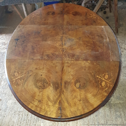 21 - A Victorian Walnut Dropleaf Table , with faults .