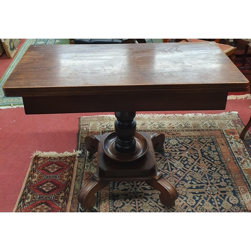 160 - A 19th Century Mahogany Foldover Tea Table on turned supports on unusual platform base. 99 x 94 x H ... 