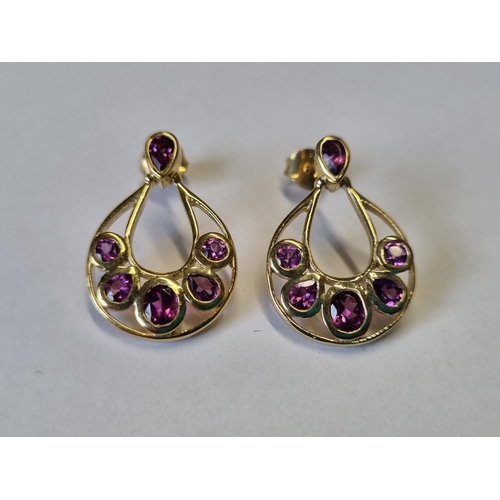 491 - A pair of Silver gem set Earrings along with a pair of Silver and rose gilt gem set Earrings.