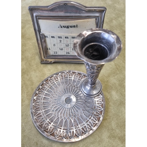 460 - A group of Silver items to include a weighted bud Vase, Calendar and a pierced Coaster.