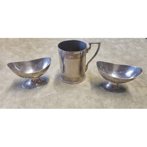 467 - A Silver coloured Tankard along with two Salts and six desert Spoons, JS & S with a Beaver hallmark,... 