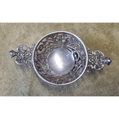 471 - A London Silver Strainer, William Comyns, A Birmingham Silver babies Spoon and Push, a Sheffield Sil... 