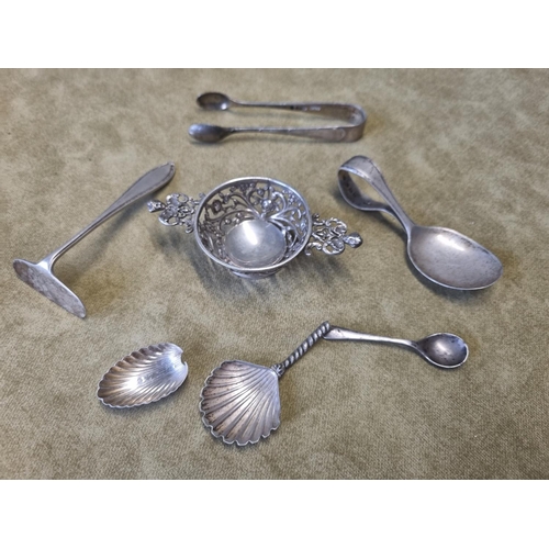 471 - A London Silver Strainer, William Comyns, A Birmingham Silver babies Spoon and Push, a Sheffield Sil... 