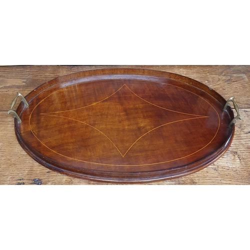 107 - A really good Edwardian Mahogany and Inlaid oval Tray with brass lifting handles. 63 x 39 cm approx.