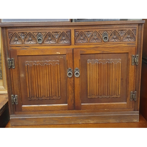 117 - A good Old Charm two door Cabinet with twin frieze drawers over panelled doors. 91 x 48 cm approx.