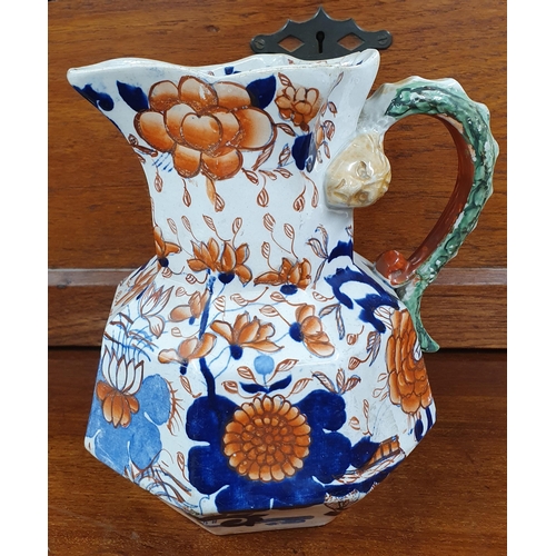 125 - A good Masons Ironstone Jug in the Imari pattern along with a quantity of other jugs etc.