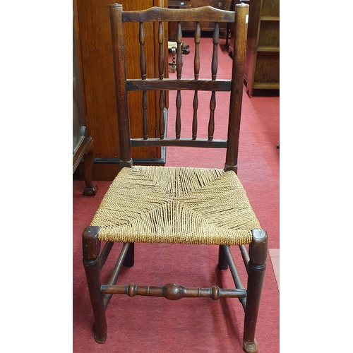 126 - A good 18th Century Elm/Oak provincial Chair with spindle back and turned pad feet on front supports... 