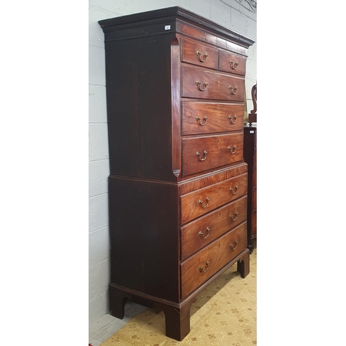 23 - An early 19th Century Mahogany Tallboy with oak sides with original swan neck handles. W 106 x D 57 ... 