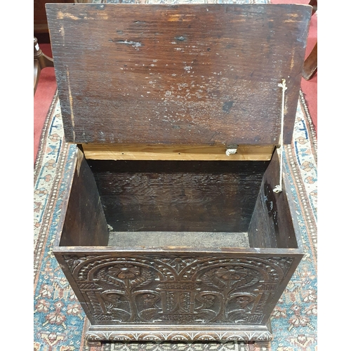 3 - A 19th, possibly 18th Century Oak Bible Box with highly carved front and ogee feet. 47 x 30 x H 50 c... 