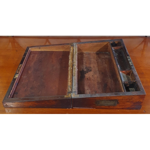 43 - A really good early 19th Century Rosewood military Writing Slope with flush lifting handles to the s... 