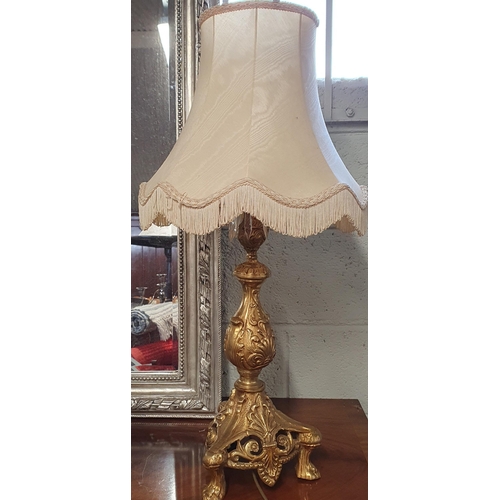 80 - A really good pair of Brass Table Lamps with classical decoration and cream shades. H 62 cm approx.