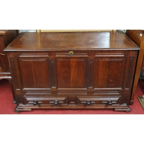 96 - An early 19th possibly 18th Century Oak Mule Chest with triple panel frieze over twin drawers. 126 x... 