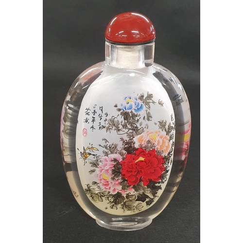 496 - Of fine quantity a Chinese painted glass snuff Bottle of flask form decorated with a floral bouquet ... 