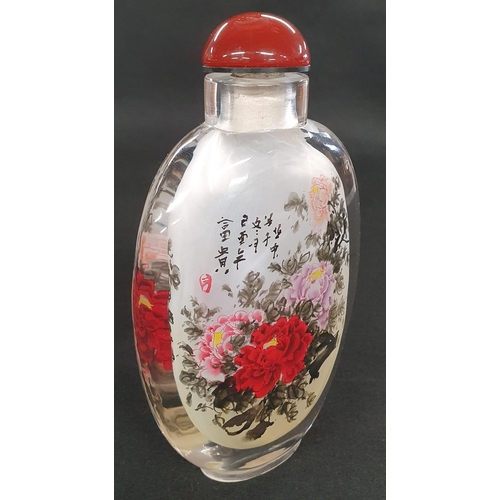 496 - Of fine quantity a Chinese painted glass snuff Bottle of flask form decorated with a floral bouquet ... 